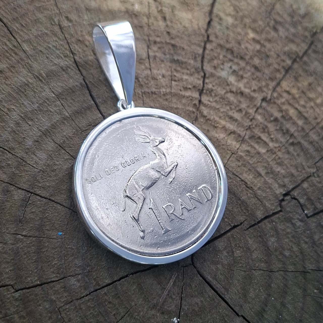 R1 coin pendant