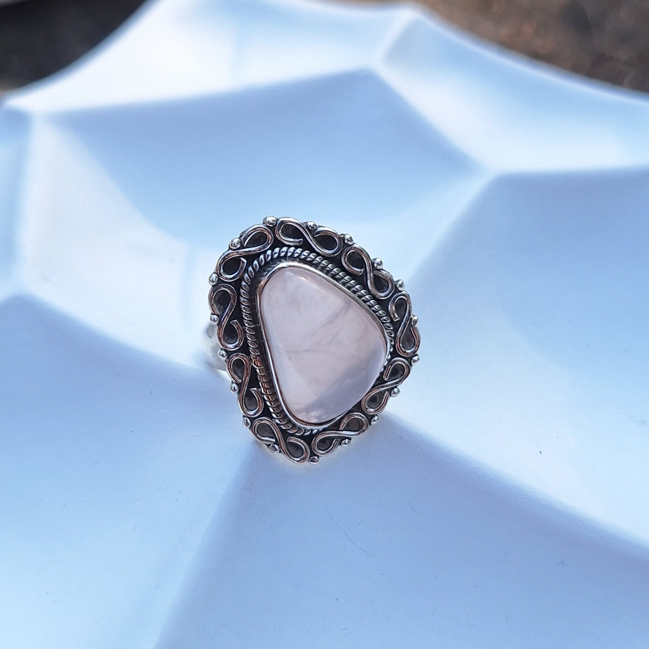 rose quartz ring with infinity frame