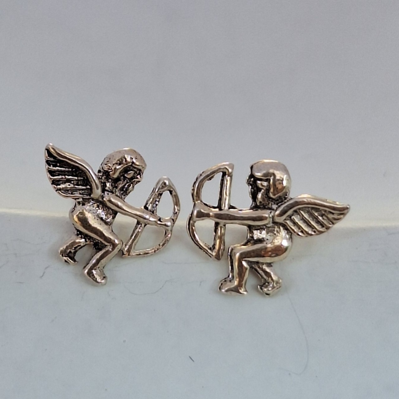 Cherub studs