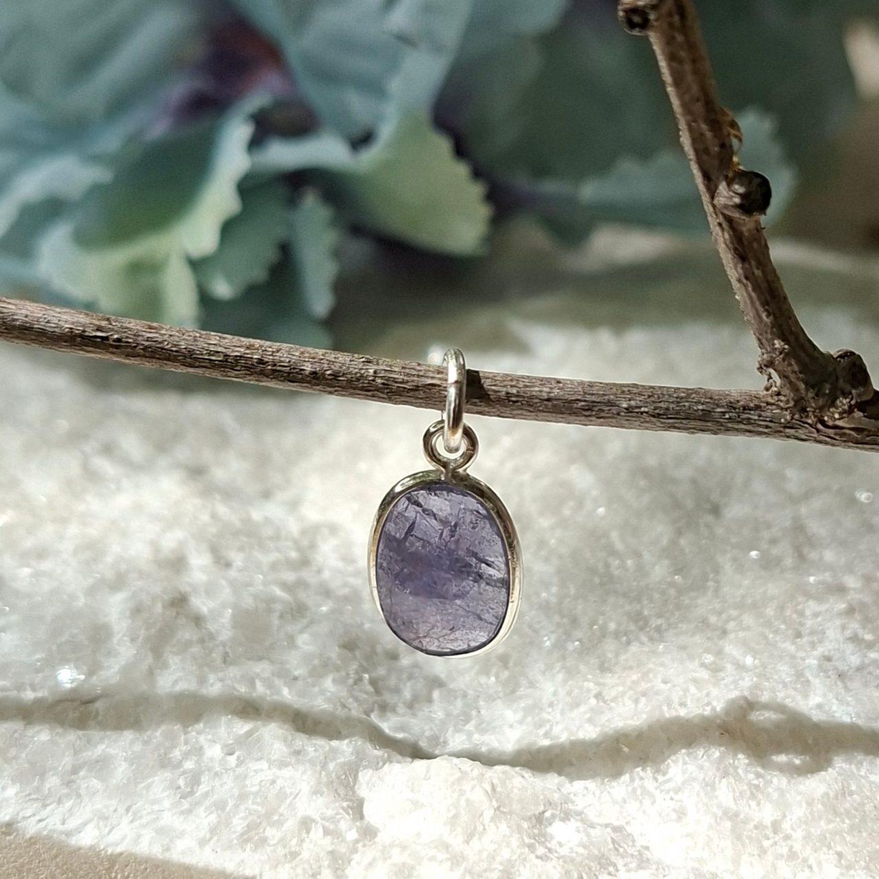 milky tanzanite pendant