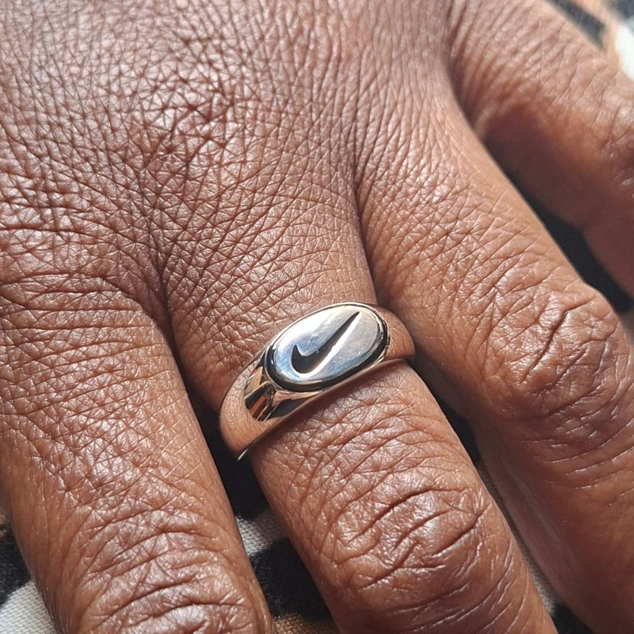 nike symbol ring oval