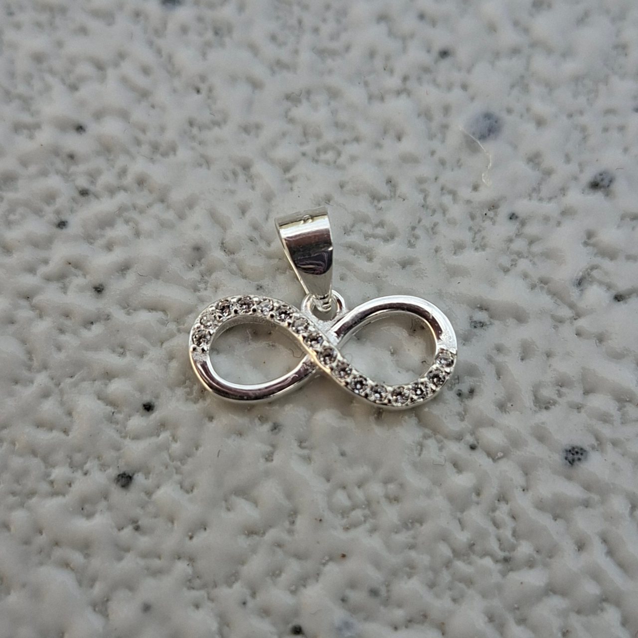 Infinity Pendant Side Profile with CZ